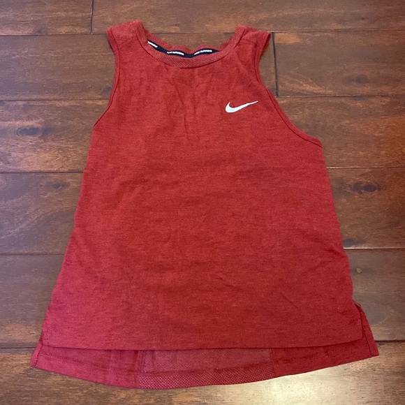 Burgundy red Nike tank. No issues. Reflective Nike symbol. - Picture 1 of 4